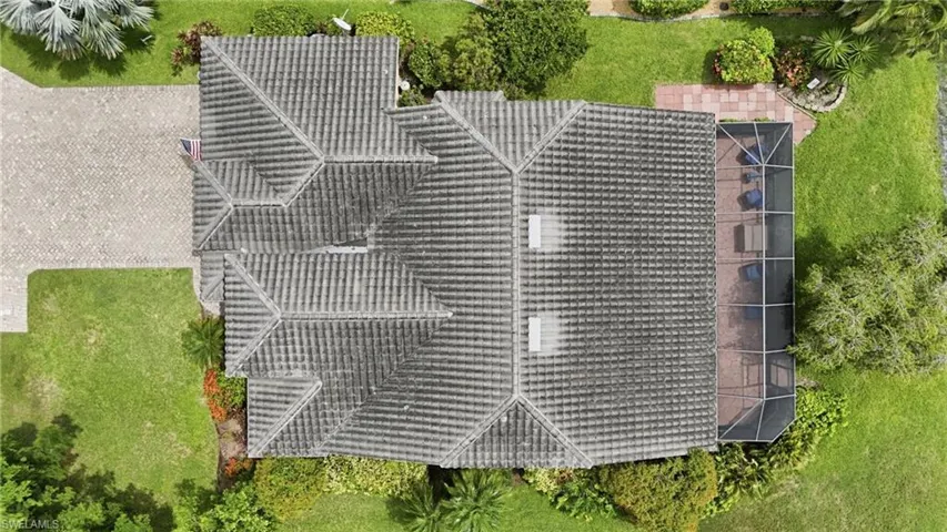 Tile roof with multiple gables and skylights