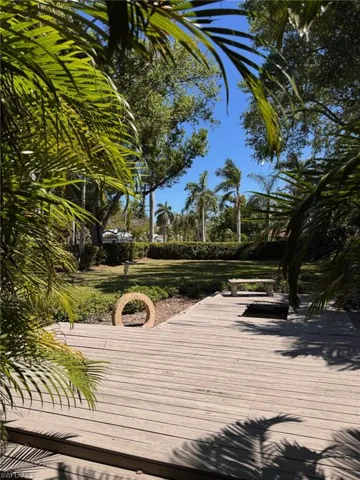 View of wooden deck in the left yard