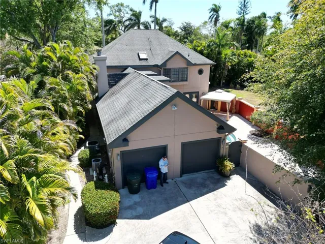 Rear of the house with the 2 car garage