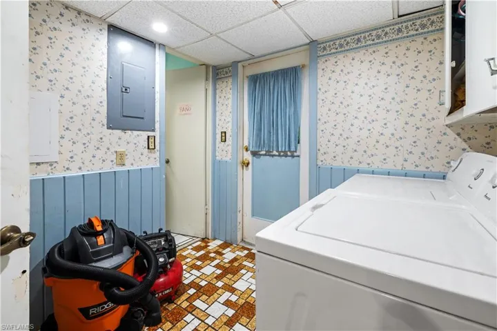 Laundry room featuring washing machine and clothes dryer