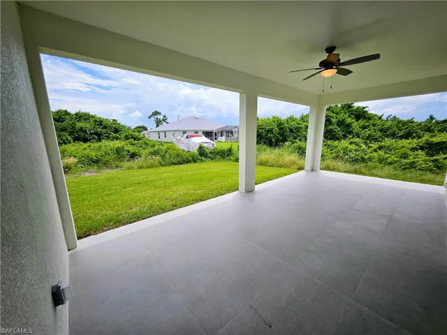 View of patio with ceiling fan