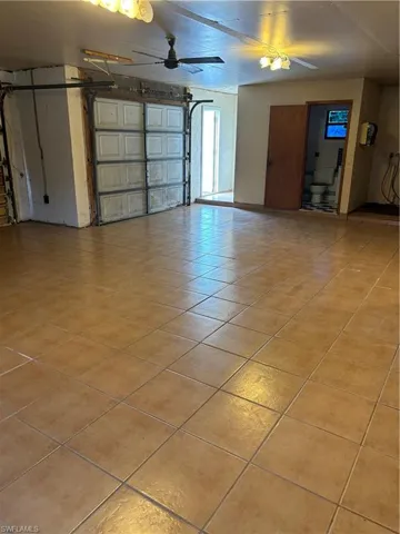 Garage featuring ceiling fan