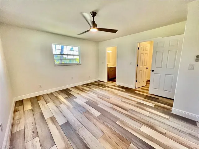 Primary bedroom with walk in closet and ensuite private bath.