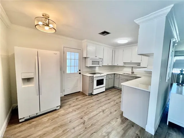 Kitchen with QUARTZ tops and newer cabinets.