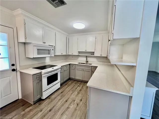 Kitchen with QUARTZ tops and newer cabinets.