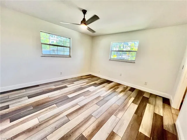 Primary bedroom with walk in closet and ensuite private bath.
