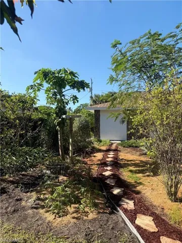 View of yard with a shed