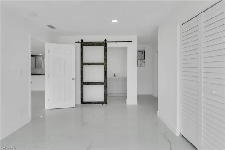 Hallway with a barn door