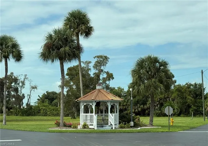 View of property's community featuring a yard and a gazebo