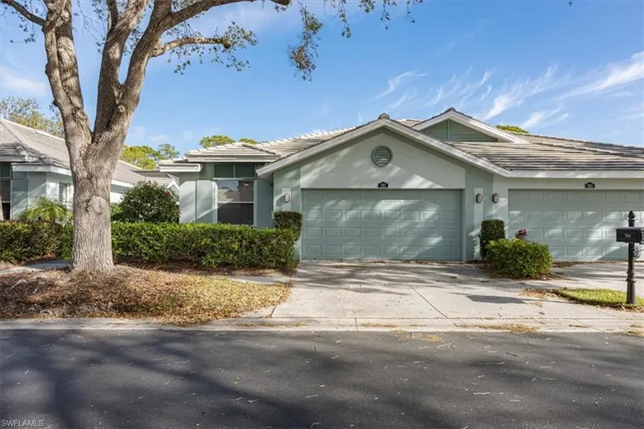 Highly desirable Villa with 2 car garage, epoxy garage floor, new garage door and new roof.