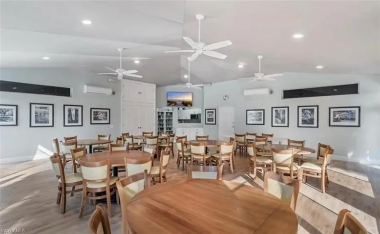 Dining space with lofted ceiling, wood finished floors and area to entertain larger groups or join in cards, Mahjongor community activities