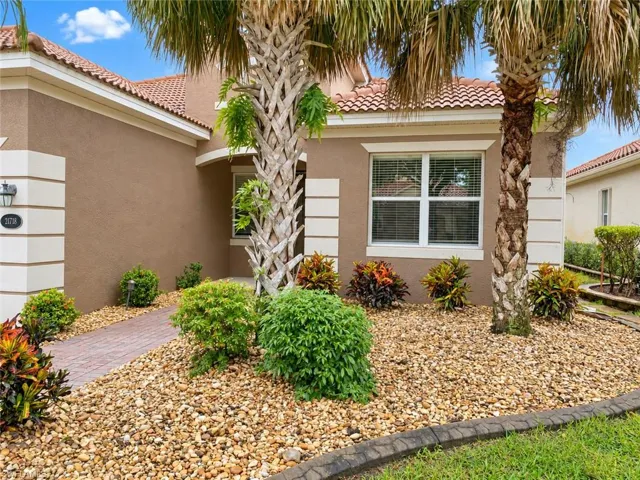 Stucco exterior with a tile roof