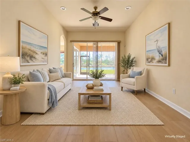 Wood-finish flooring, recessed lighting, and a ceiling fan