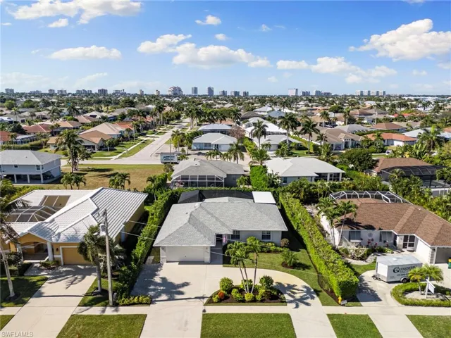 Aerial perspective of suburban area with skyline