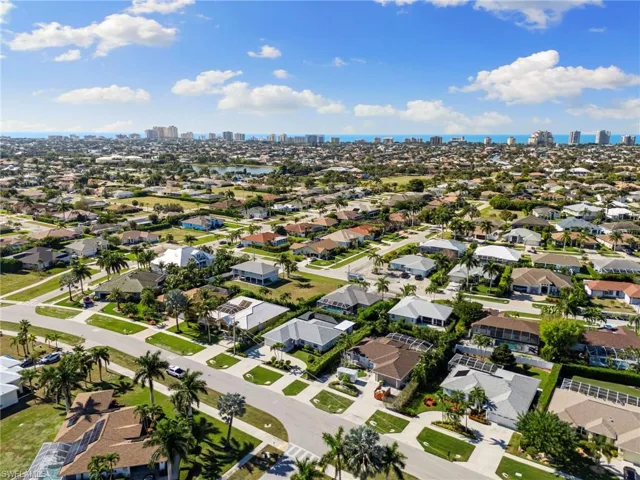 View of property location with city skyline and nearby suburban area