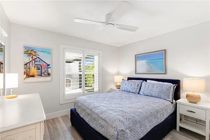 Bedroom featuring light wood-style floors and ceiling fan