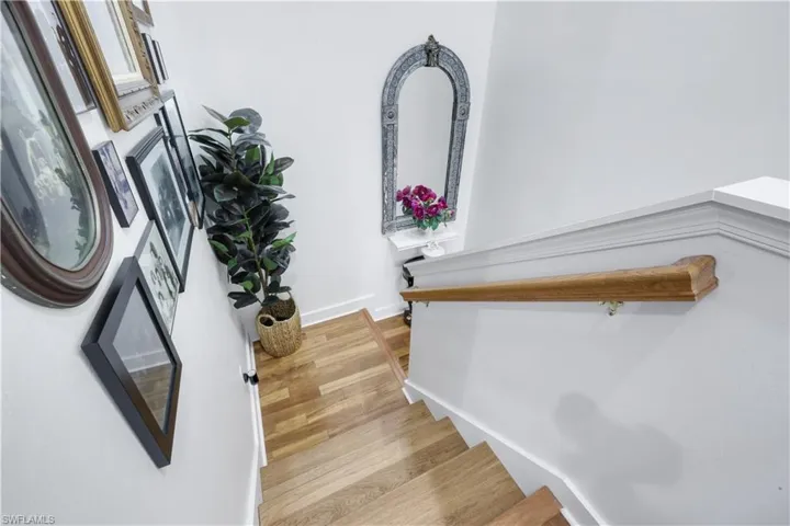 Wooden stairway up to second floor Ensuites
