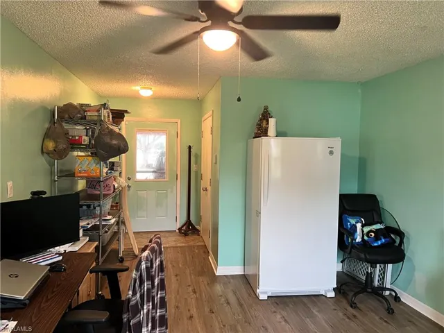 Home office, Den,  many uses! Exterior door leads to the carport.