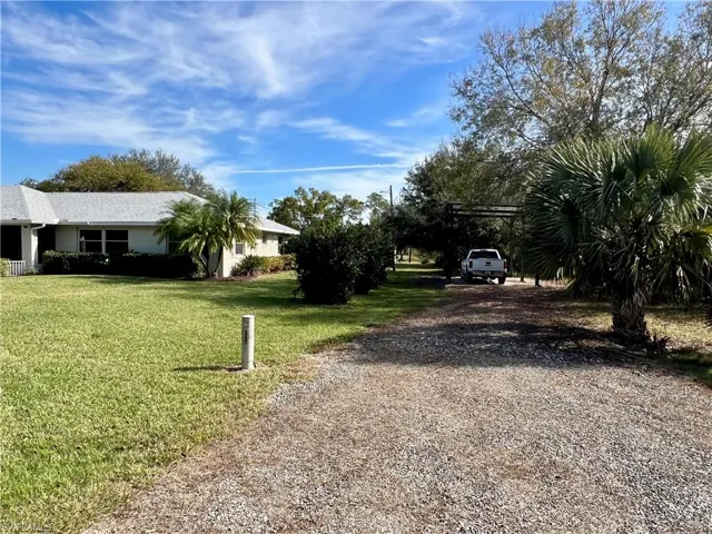 Road to detached carport.