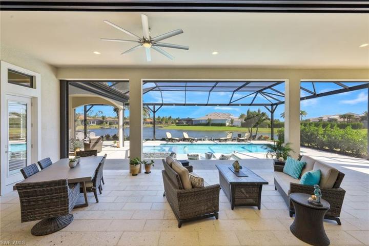 Part of covered lanai. One of 2 covered areas. With "3" fire pits. One on each end of sofas and table in middle.