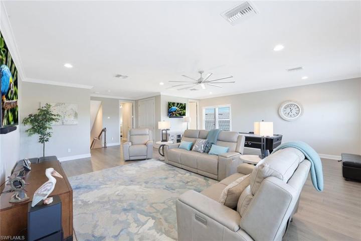 Another view of Bonus room with included full size air hockey table and one of 10 flat screen tv's all with sound bars!