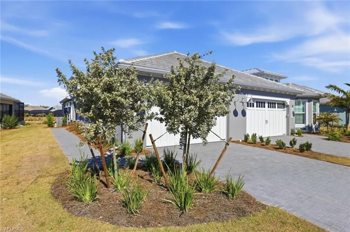 Beautiful upgraded landscaping through out the property