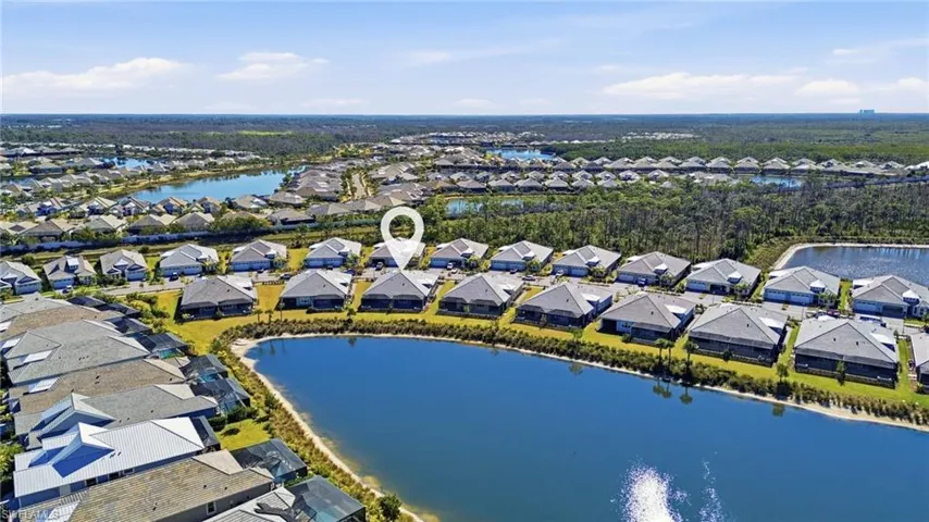 Aerial View of the Property with lake Views