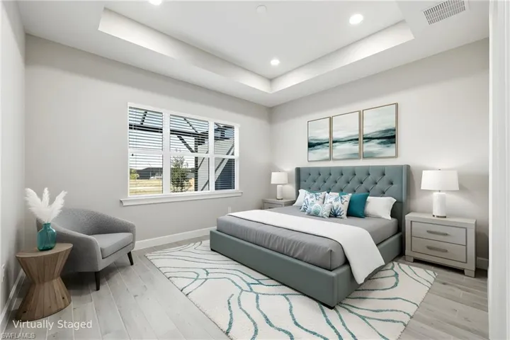 Virtually Staged Master Bedroom with access to ensuite Master Bathroom