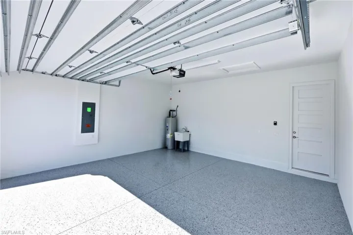 Full 2-Car Garage with Epoxy Flooring and sink