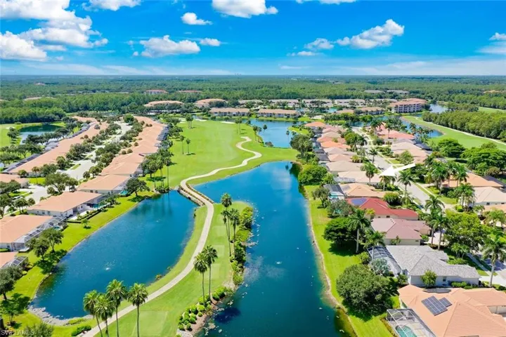 Cedar Hammock single family home overlooking the 10th hole of the golf course with multiple water features, and lush landscaping