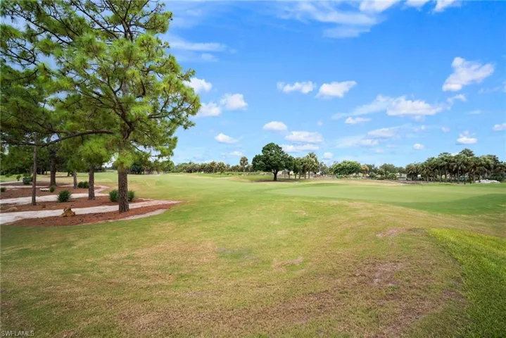 View of property's community featuring a lawn