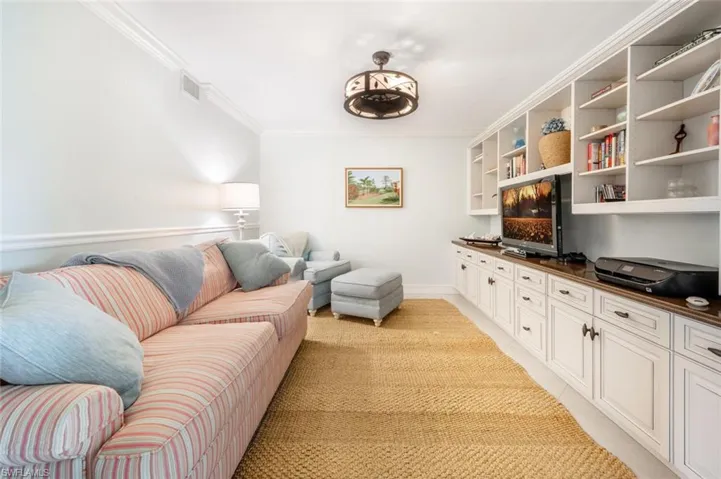 Den With Custom Cabinetry