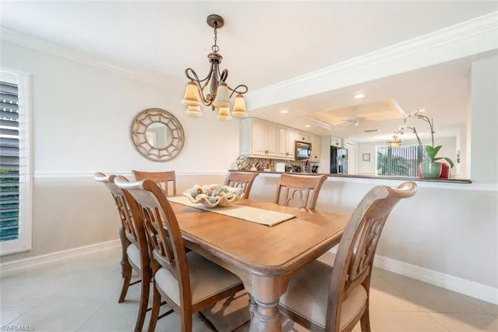 Dining Backs Up to Kitchen Passthrough