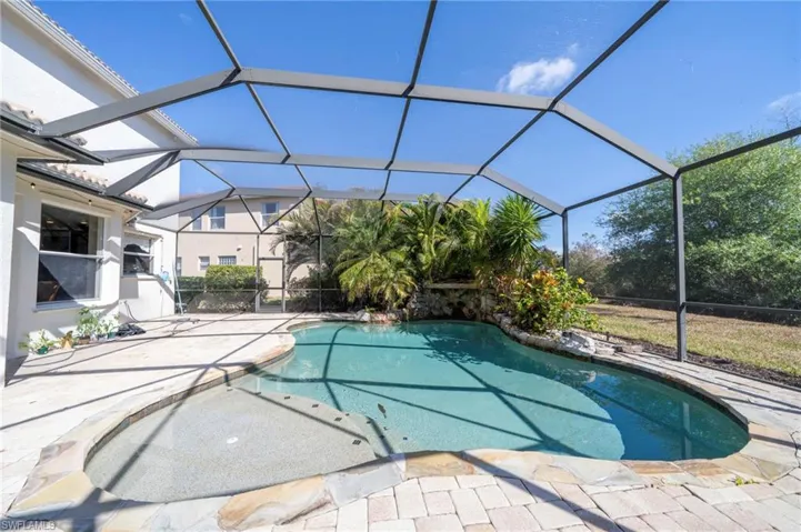 Tropical salt water pool & a large covered lanai for outdoor entertaining