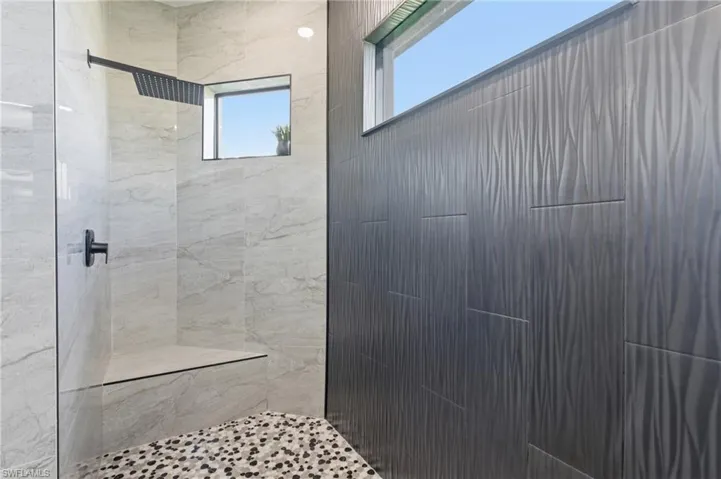 Primary tiled walk-in shower