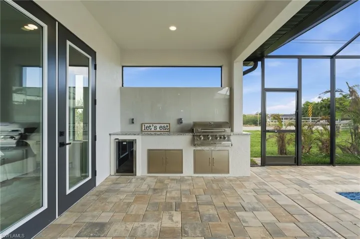 Screened in lanai with full outdoor kitchen