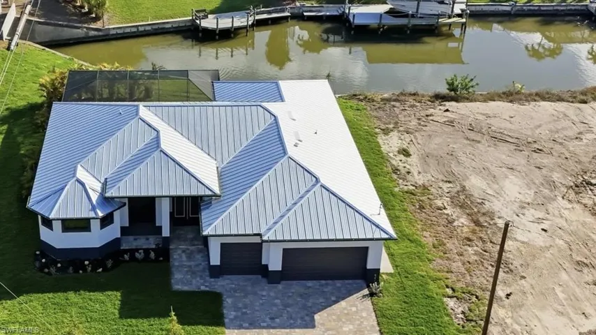 View of subject property with a nearby body of water