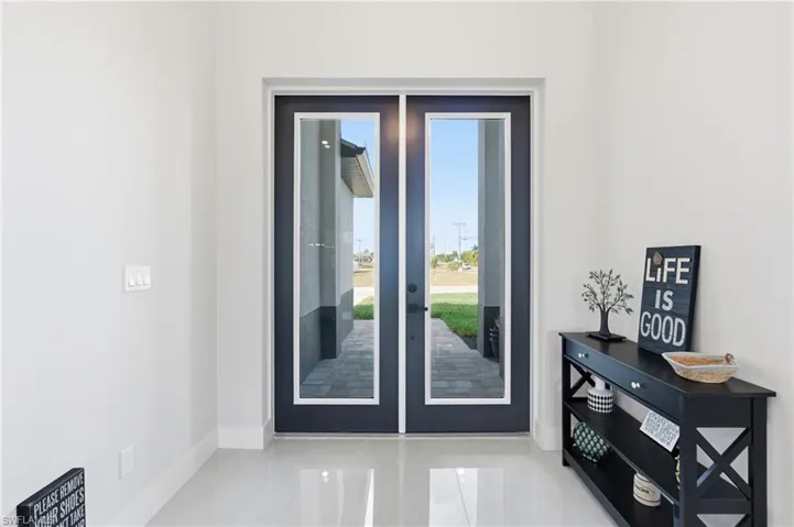 Entryway featuring french doors