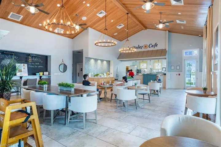 Community lobby featuring high vaulted ceiling and wooden ceiling