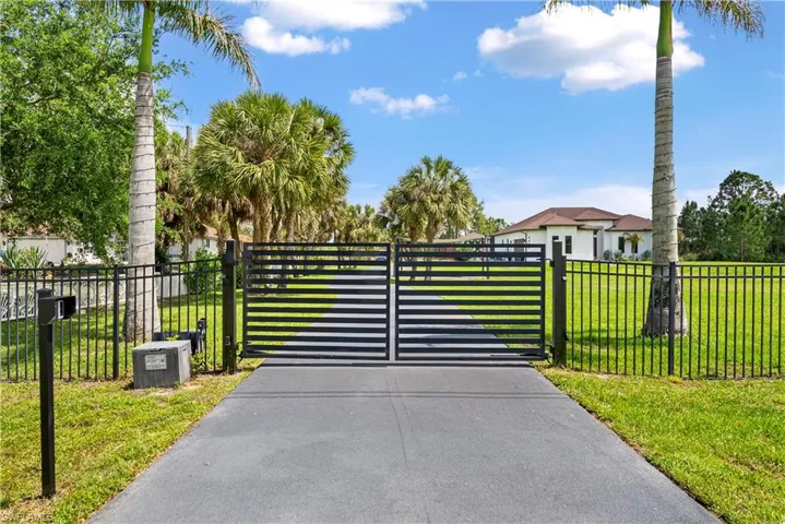 Gate with a fenced front yard