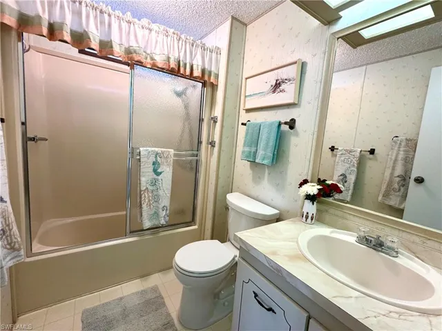 Guest Bathroom with a tub/shower combo.