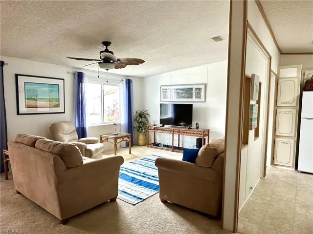 Living room and kitchen walkway.