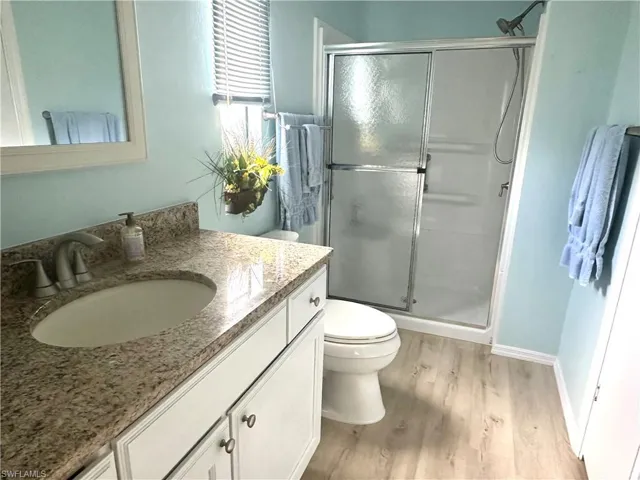 Master bathroom, featuring Silestone counter top and walk in shower.