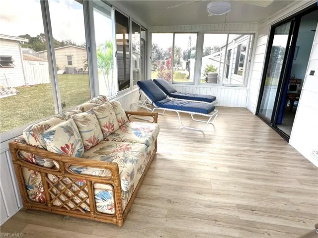 Lanai/Sun Room with sliding glass windows.