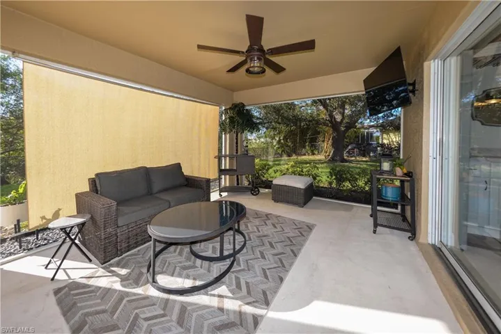 View of patio featuring ceiling fan and outdoor lounge area