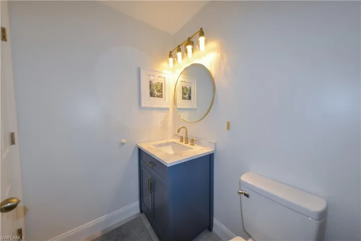 Bathroom featuring toilet and vanity