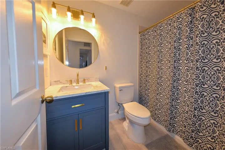Bathroom featuring toilet and vanity