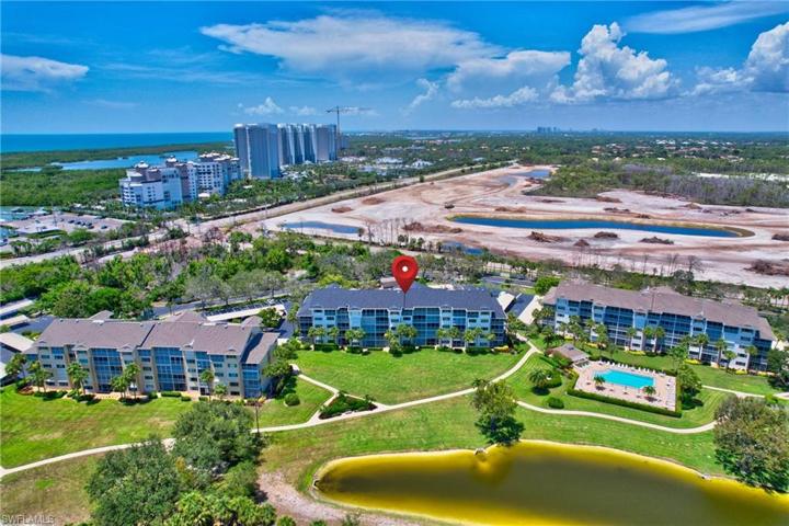 Rear of building with community pool an easy walk away