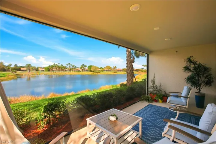 View of patio / terrace with a water view