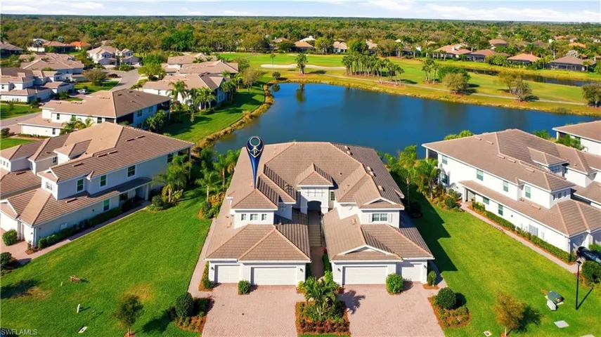 Aerial view of residential area with a large body of water